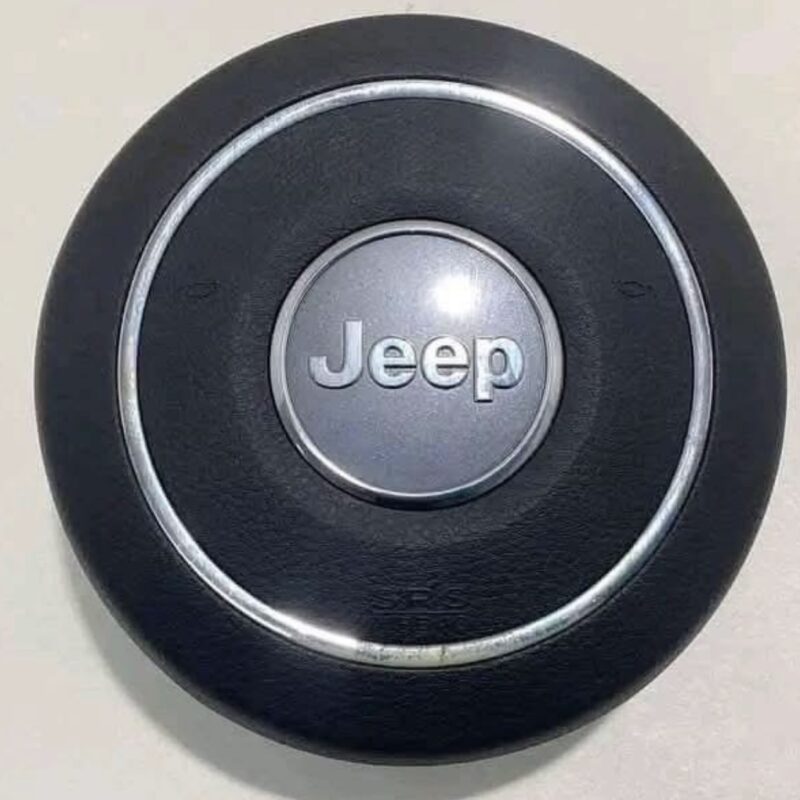 OEM Jeep Wrangler JK steering wheel airbag module.