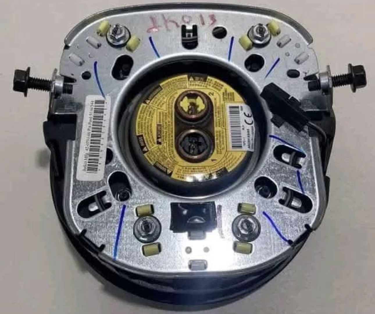 OEM Jeep Wrangler JK steering wheel airbag module.